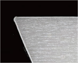 Cross-section of the tip of a probe with a processed surface