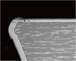 Cross-section of the tip of a probe with a processed surface (enlarged view)