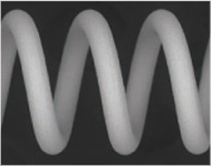 A coil with a processed surface